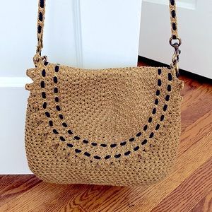 Eric Javits NY Squishee Straw shoulder bag. Black grosgrain ribbon stitching.